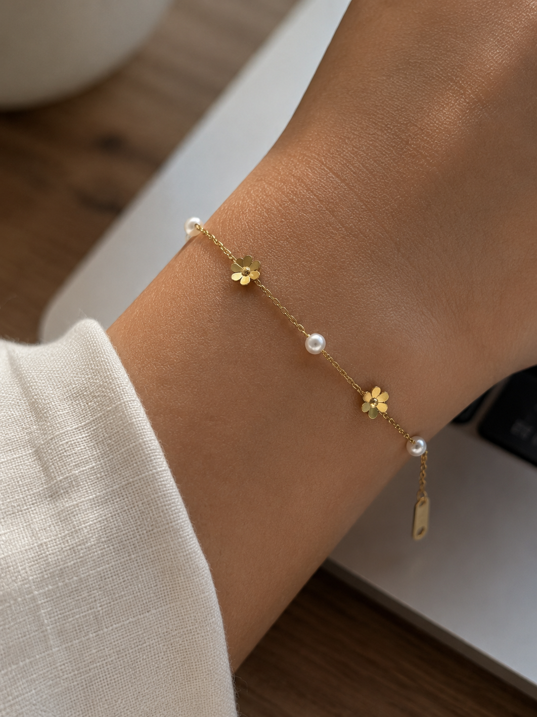 Gold Daisy & Pearl Charm Bracelet close-up — gold bracelet India — SIOBHÁN
