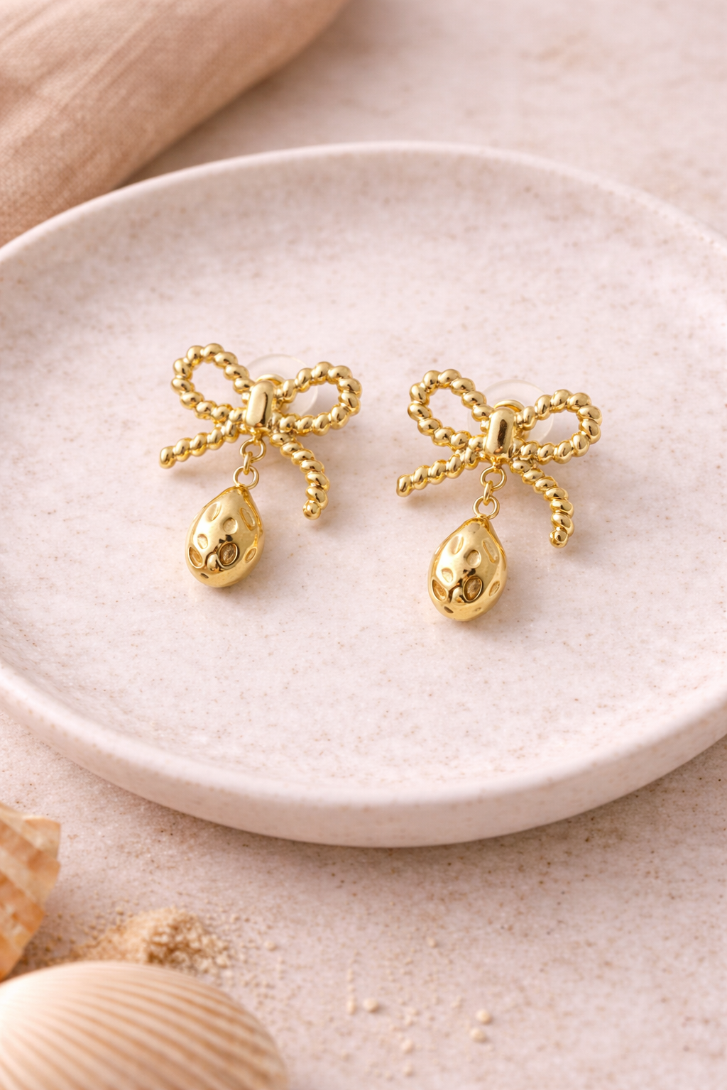 Gold Bow Tear Drop Earrings product shot — anti-tarnish gold earrings India — SIOBHÁN