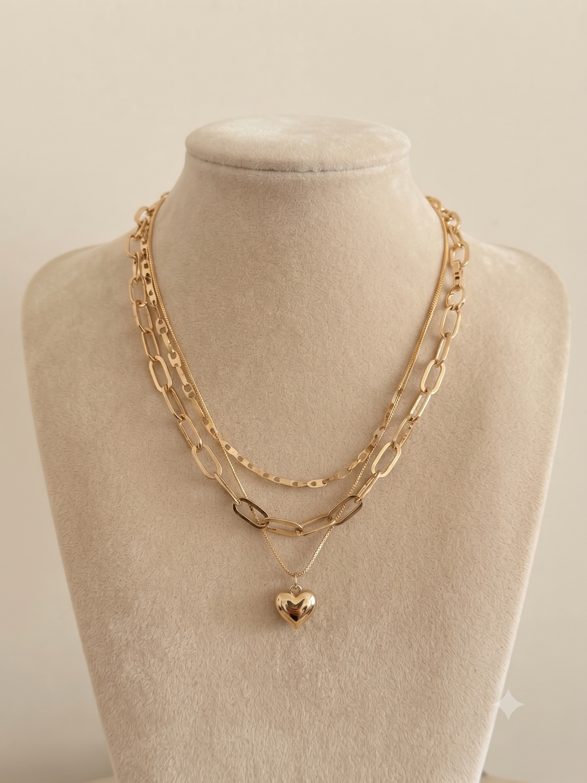 Golden Heart Layered Chain Necklace flat lay showing layered gold chains and heart pendant