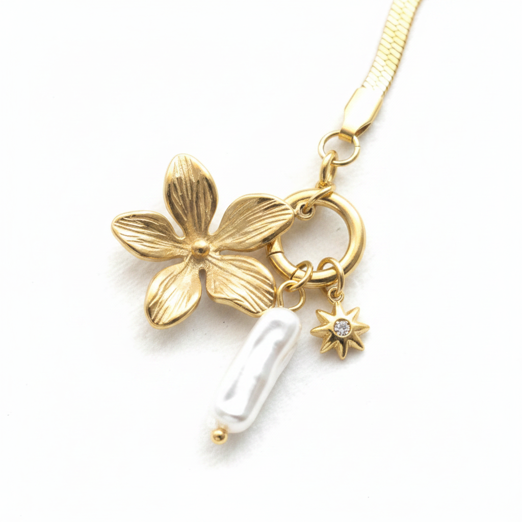 Gold Blossom & Pearl Bracelet charm detail close-up — flower, pearl, and star charms