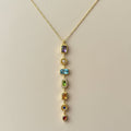 Multi-Gemstone Vertical Pendant Necklace on beige background — anti-tarnish gold necklace India — SIOBHÁN