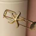 Ocean Muse Gold Cuff Bracelet close-up of gold starfish cuff — anti-tarnish gold cuff bracelet India — SIOBHÁN