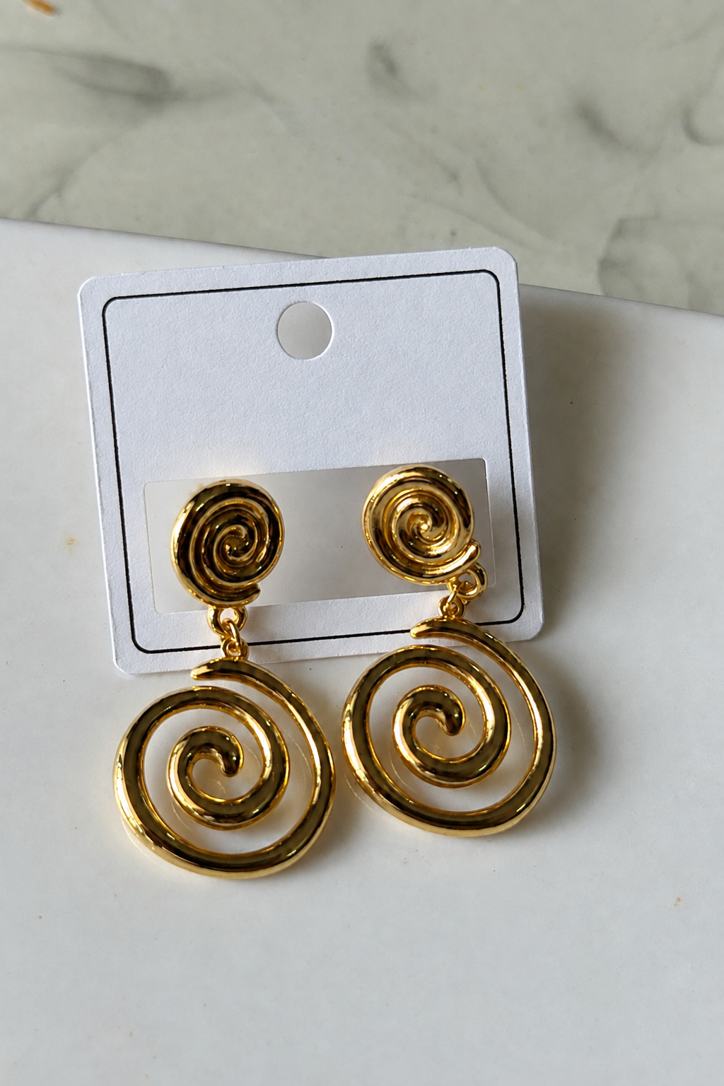 Swirl Spiral Drop Earrings close-up — gold drop earrings India — SIOBHÁN