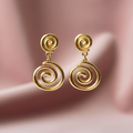 Swirl Spiral Drop Earrings dusty rose background exact size — anti-tarnish gold earrings India — SIOBHÁN