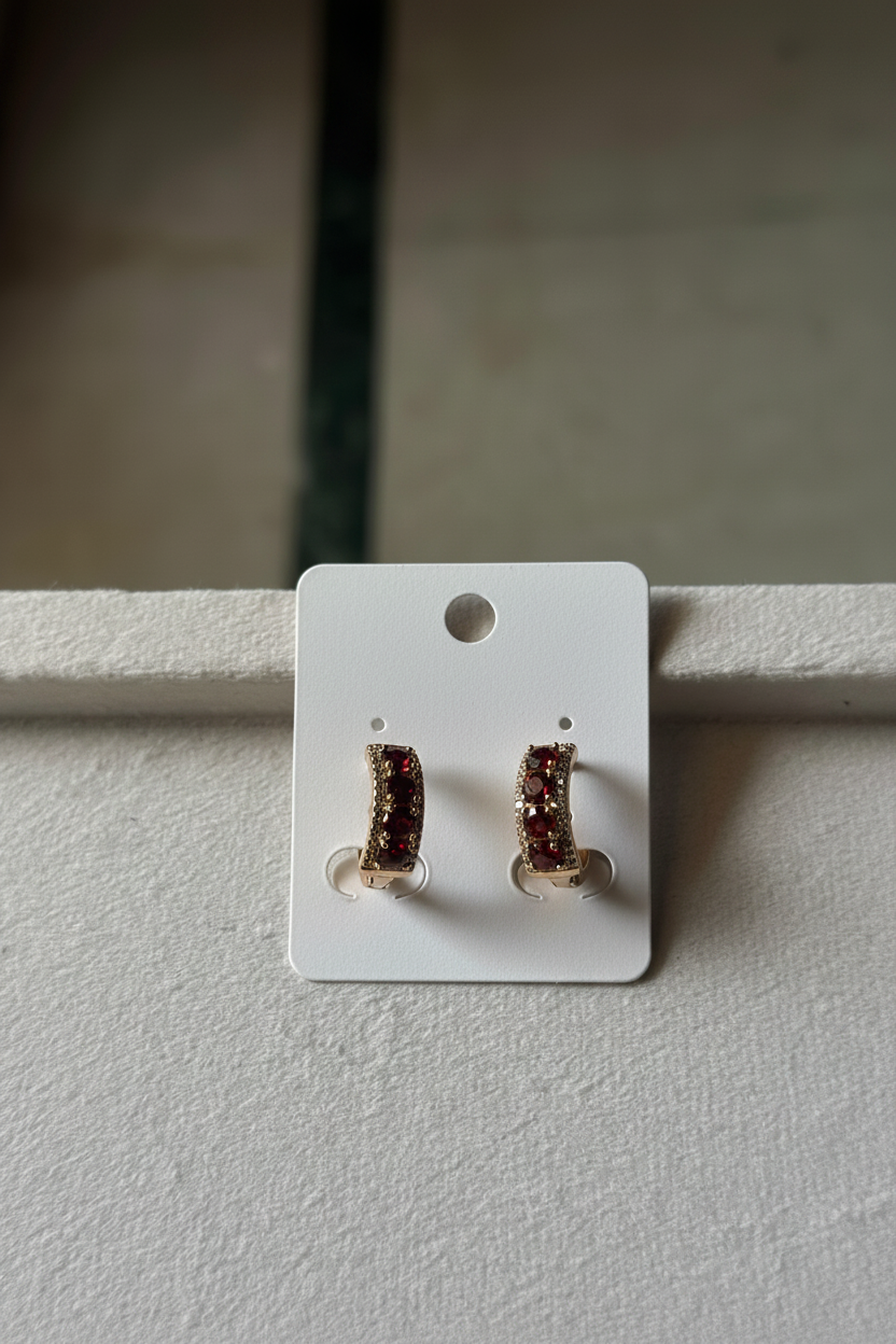 Rose Gold Huggie Hoops with Garnet CZ Stones