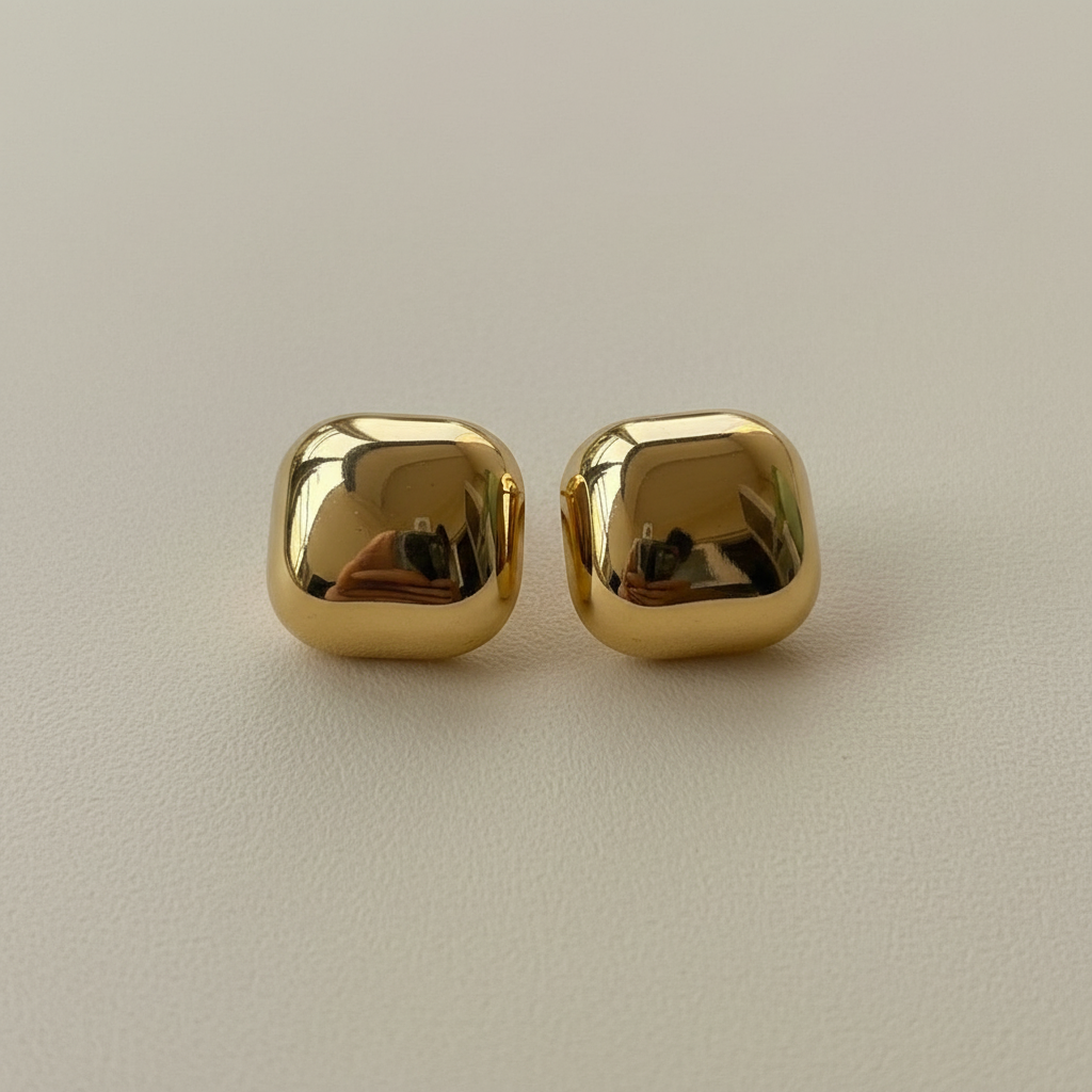 Gold Dome Studs on beige background — anti-tarnish gold stud earrings India — SIOBHÁN