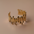 The Molten Cuff gold wave bracelet beige background — anti-tarnish gold cuff bracelet India — SIOBHÁN