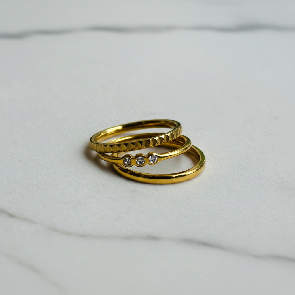 Gold Trio Ring Stack Set — marble flat lay