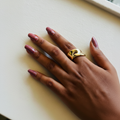 Gold Sculptural Crossover Wide Band Ring — on finger editorial