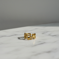 Gold Chain-Link Open Cuff Ring — marble flat lay