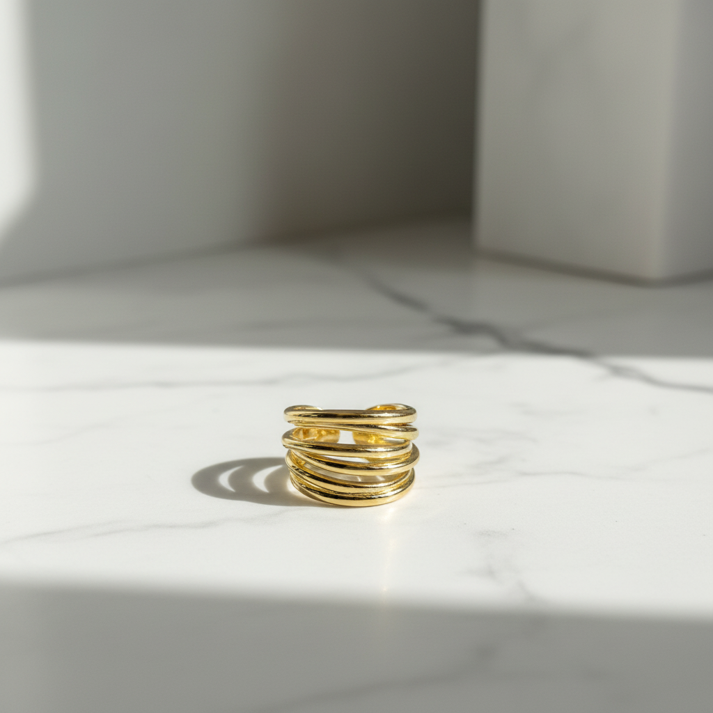 Gold Multi-Band Stacked Ring — Marble Flat Lay