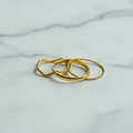 Minimalist Gold Ring Stack Set — marble flat lay