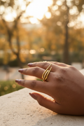 Textured Leaf Open Ring — on finger, golden hour