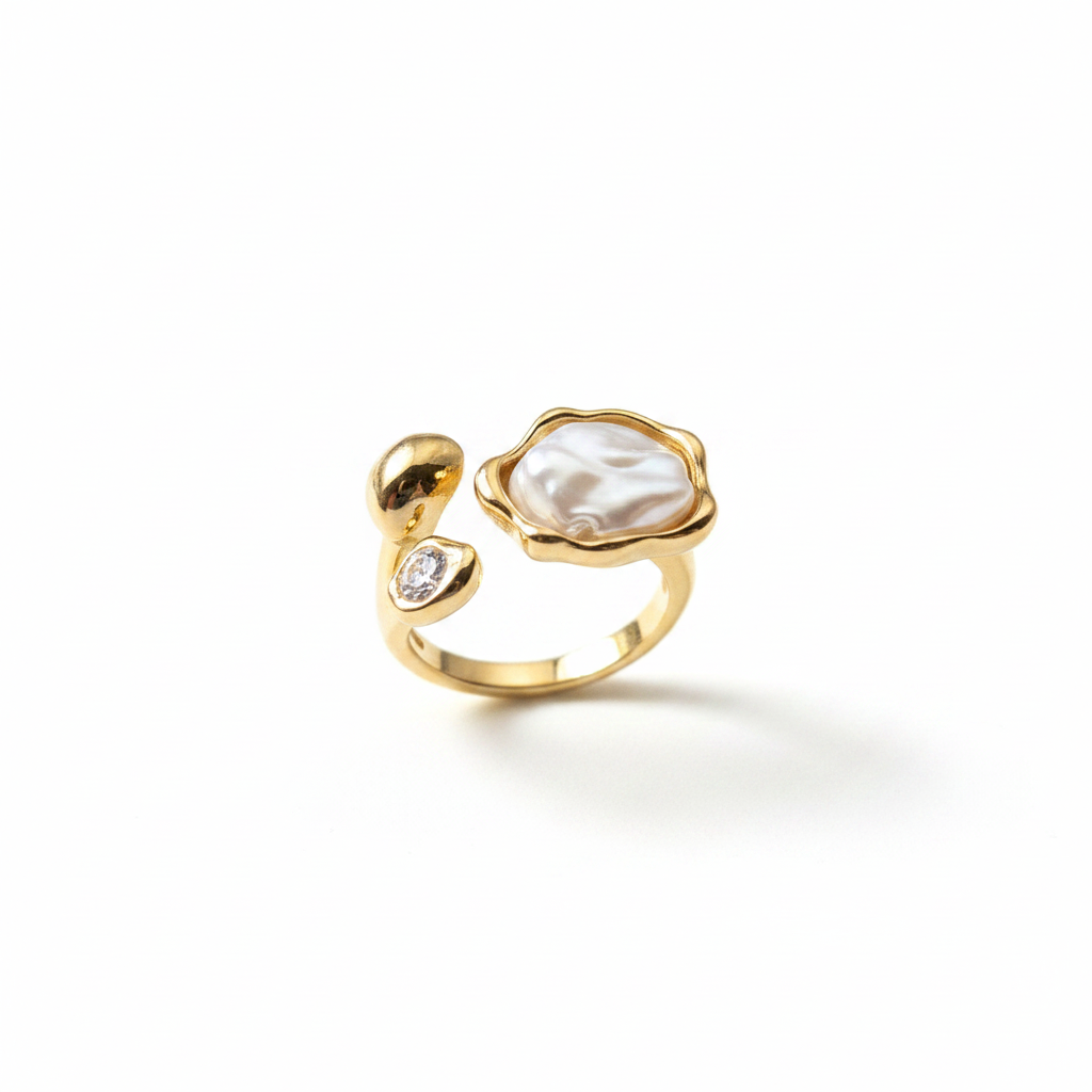 Gold baroque pearl open ring on white background