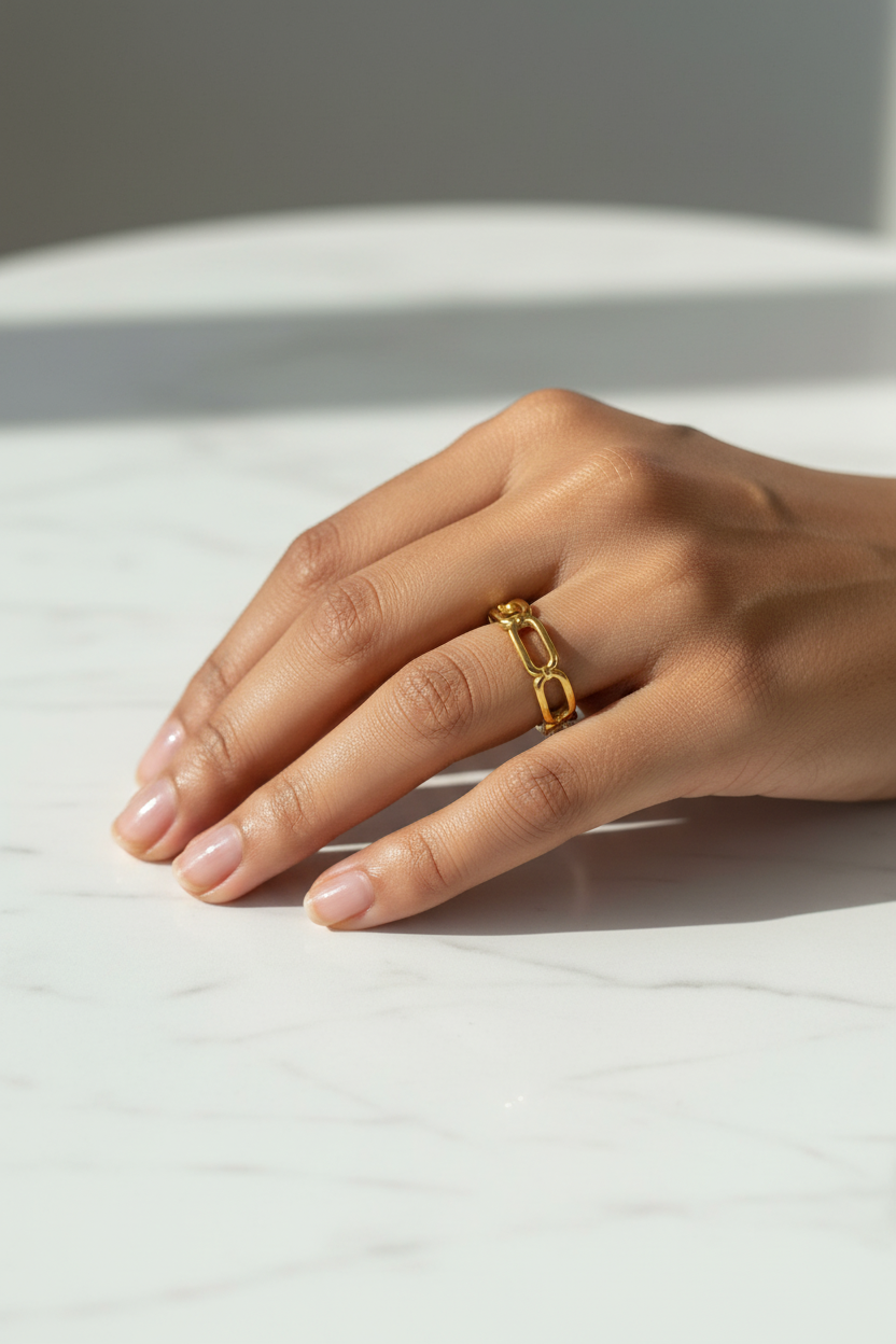 Rectangular Chain Link Ring — on finger, marble daylight