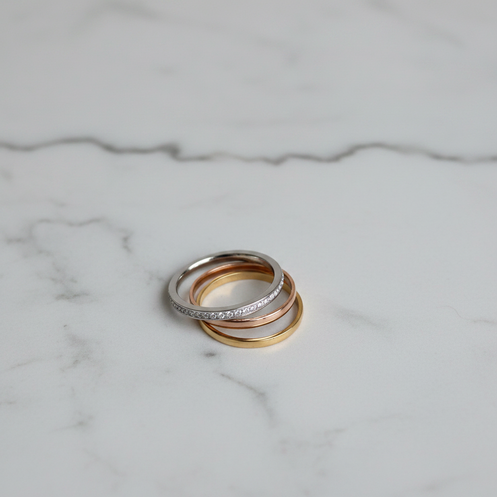 3-Tone CZ Eternity & Plain Band Ring Stack Set — marble flat lay