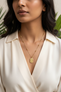Gold satellite chain necklace worn by Indian woman
