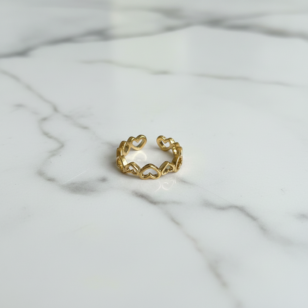 Gold Open Heart Adjustable Ring — marble flat lay