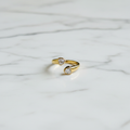 Gold Double Heart Toi et Moi Ring — marble flat lay