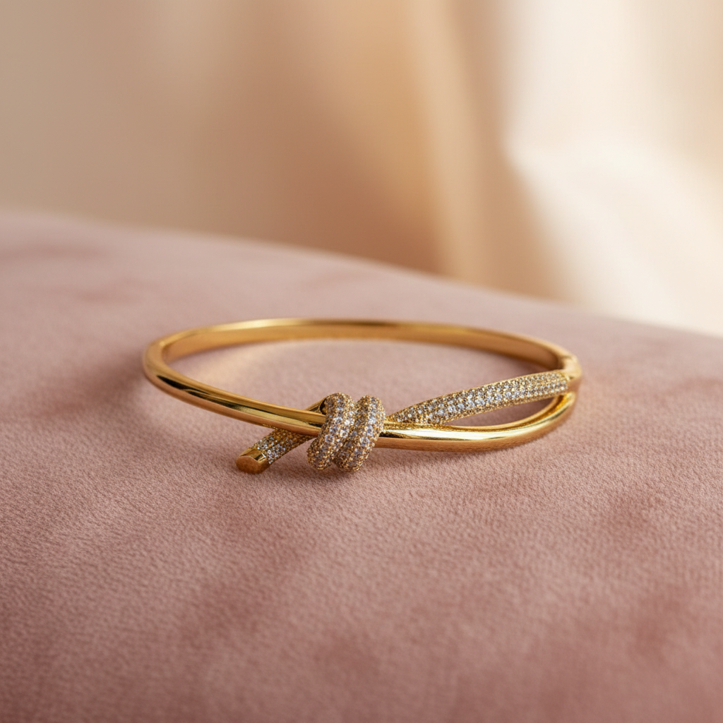 Pavé Knot Bangle — rose velvet background