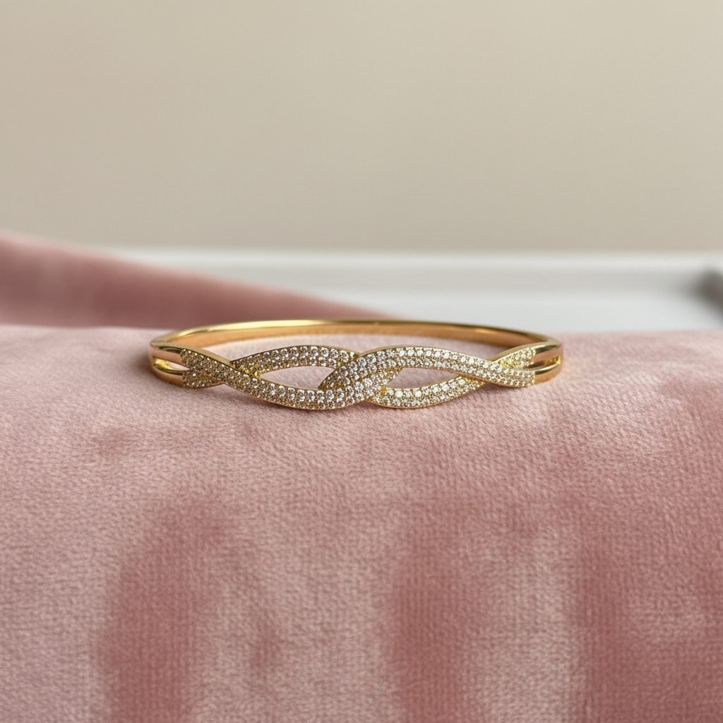 Pavé Twist Bangle — rose velvet background