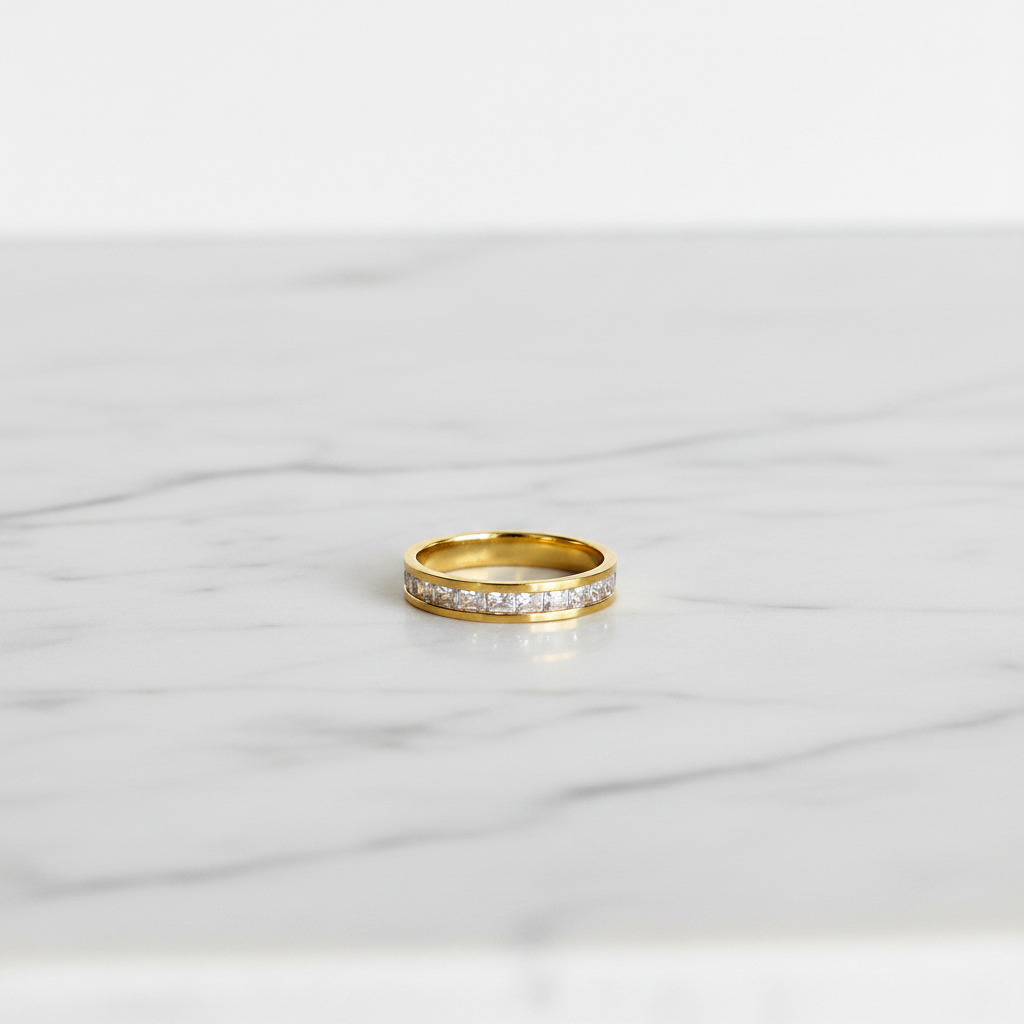 Gold Pavé Channel Eternity Band Ring — marble flat lay