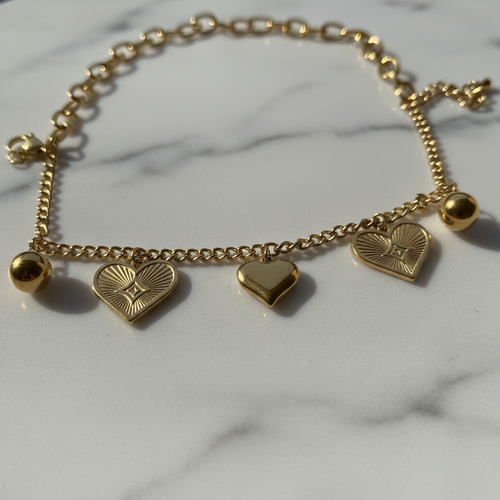 Double Chain Heart Charm Bracelet on marble close-up — waterproof gold bracelet India — SIOBHÁN