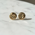 Gold Swirl Studs on marble — anti-tarnish gold stud earrings India — SIOBHÁN