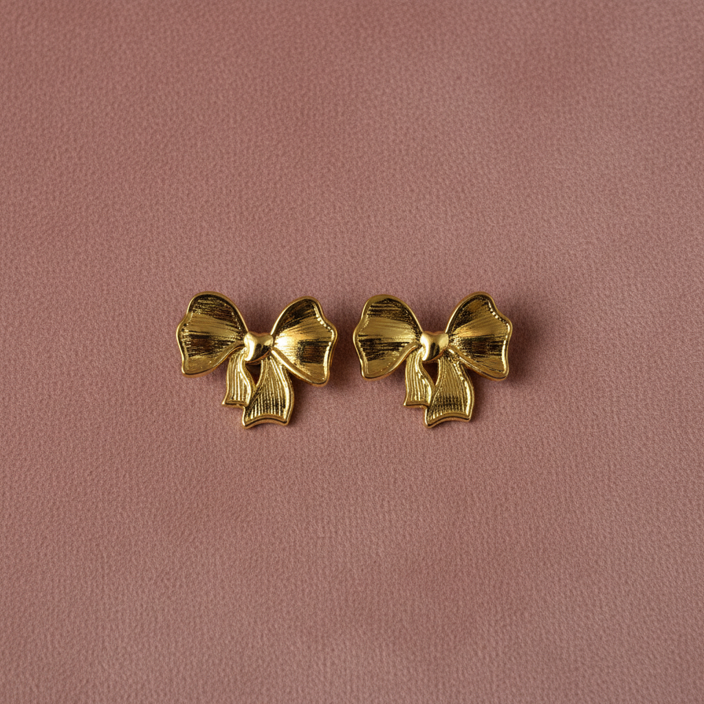 Bow Knot Earrings overhead flat lay — waterproof gold earrings India — SIOBHÁN