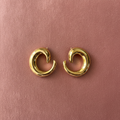 Aurora Crescent Hoops overhead flat lay — anti-tarnish gold hoops India — SIOBHÁN